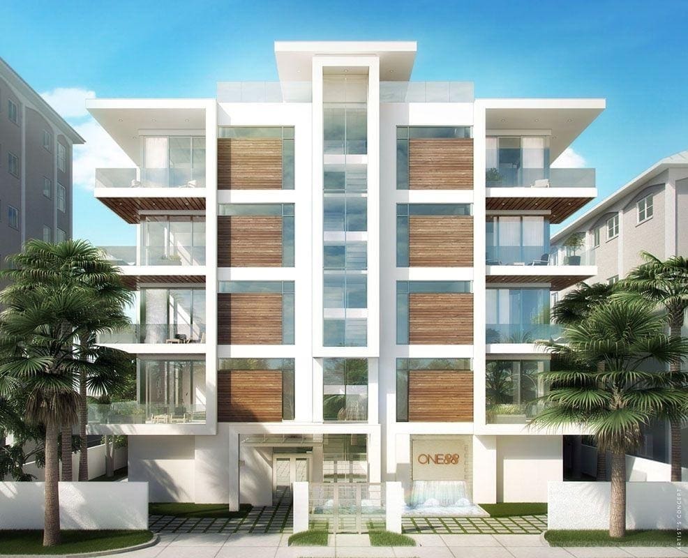 Sleek white condominium with glass balconies