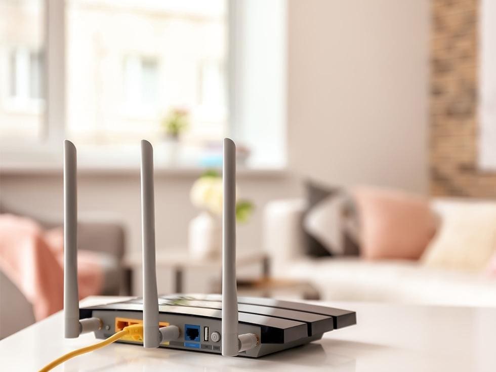 Wi-Fi router on a white table.