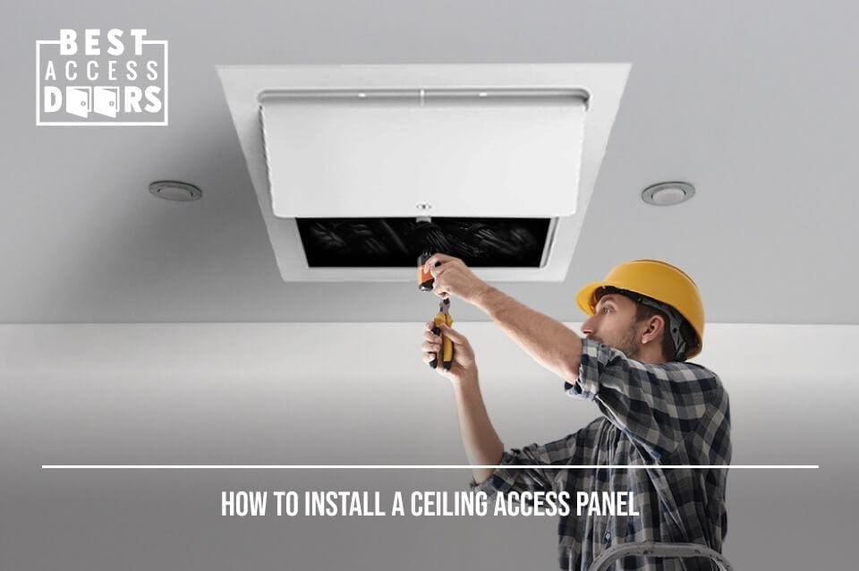 Worker installing ceiling access panel.